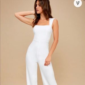 Unworn white jumpsuit perfect condition with tags
